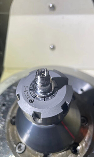 How to Use a Five Axis Machining Center to Process Titanium Alloy Shaped Parts